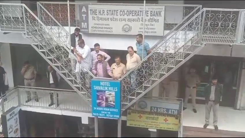 Villagers and area residents surrounded the co-operative bank in Nauhradhar area today.