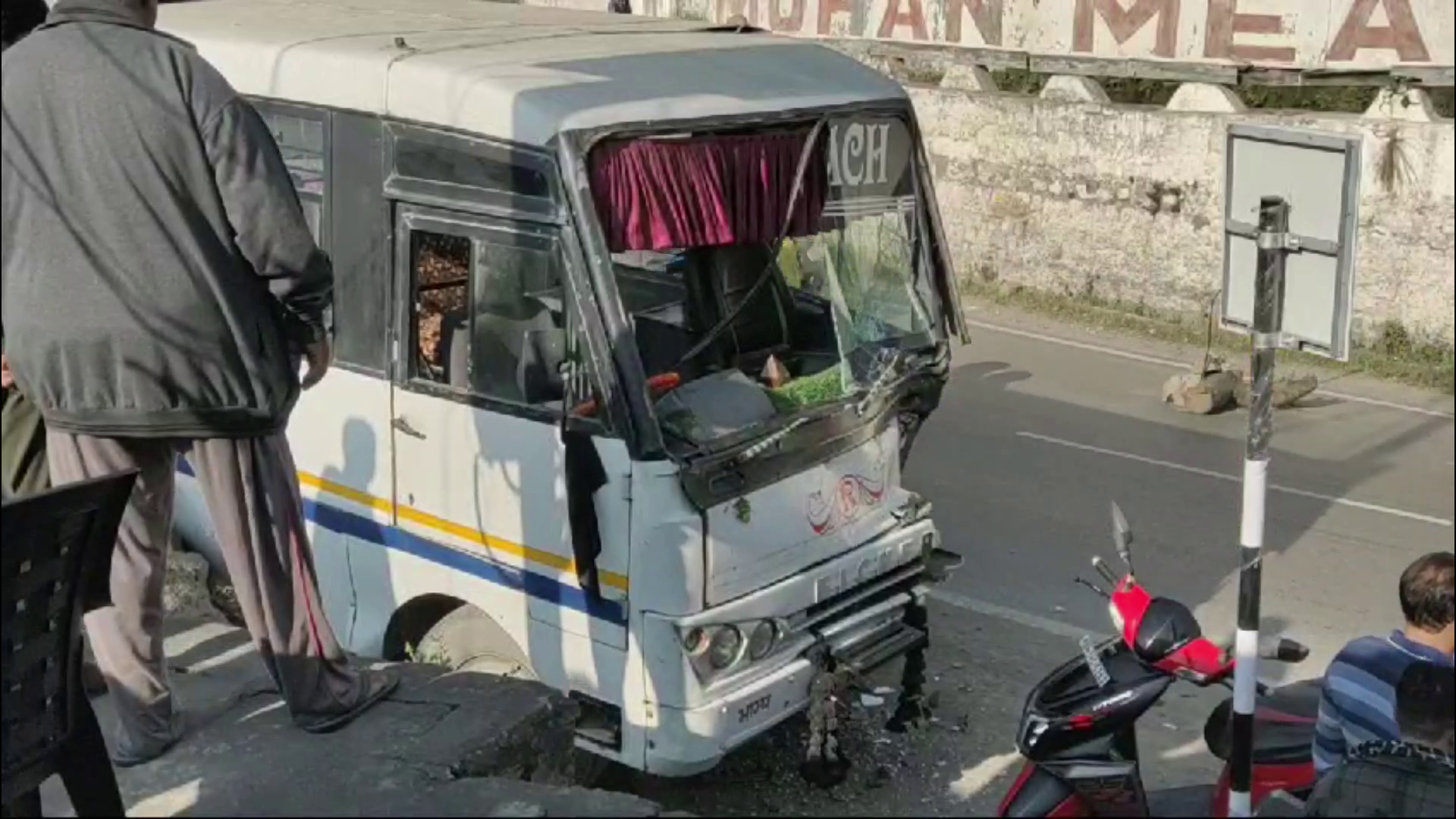 Speeding truck hits bus and car parked on roadside